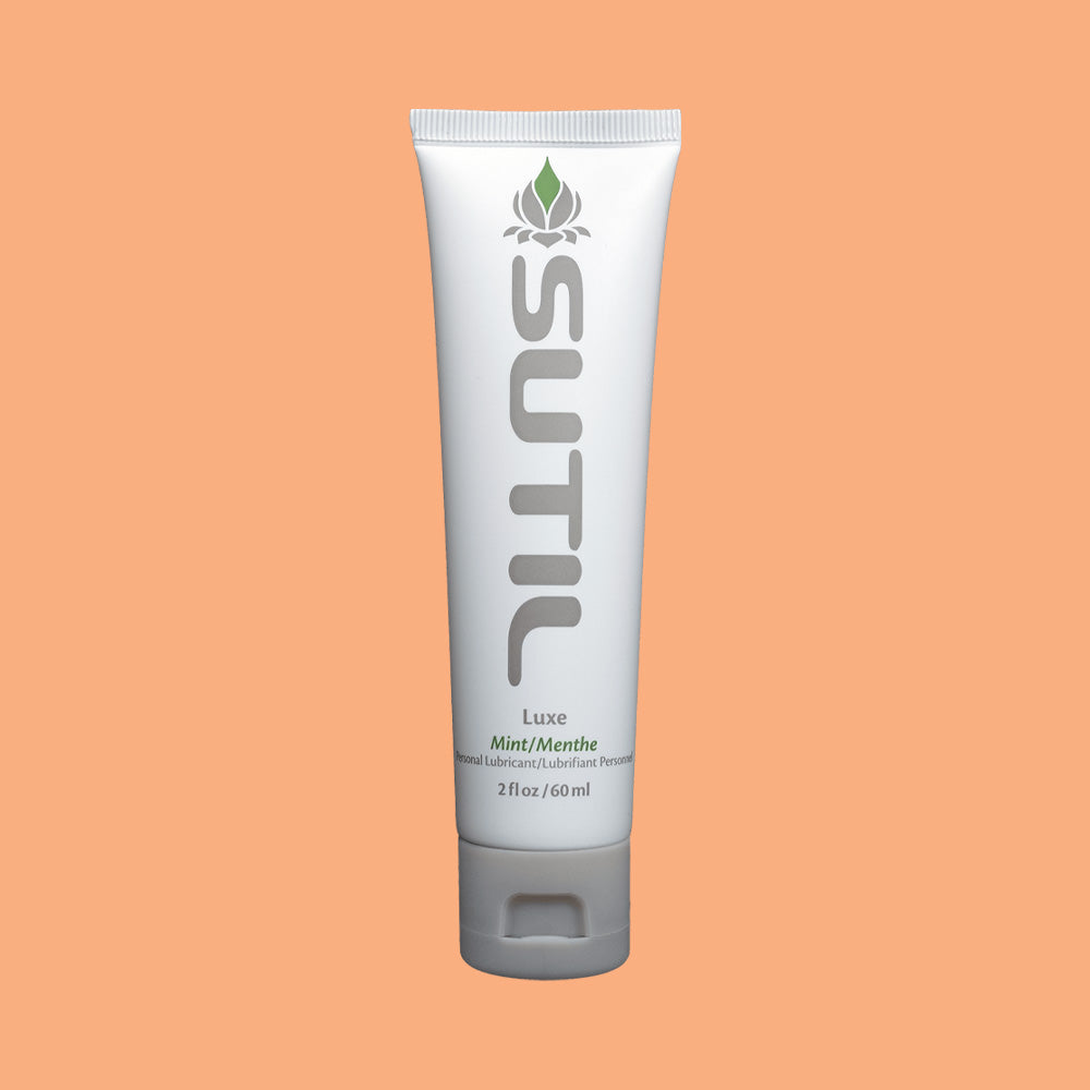 Sutil Flavor Mint lube on an orange background